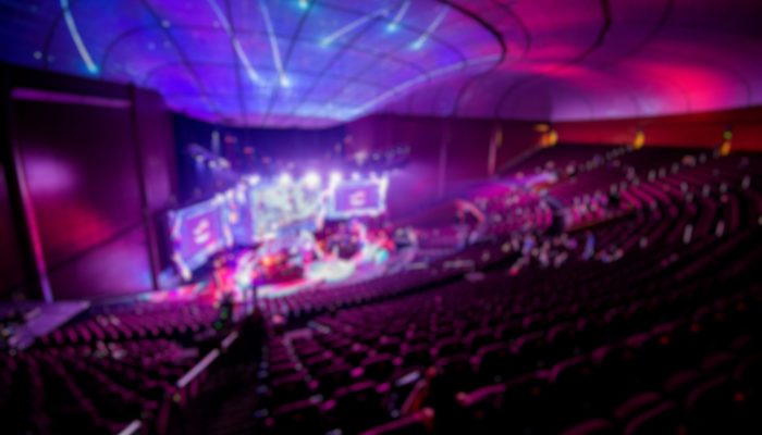 Abstract blurred background of big esports gaming event at big arena